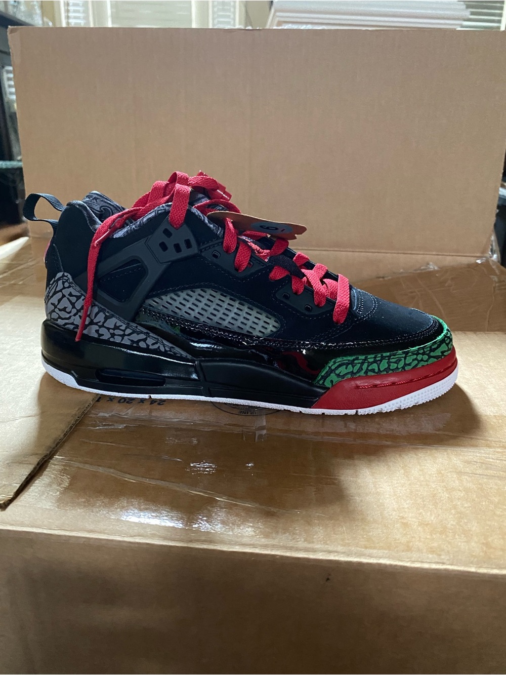 Jordan Kids Black Sneakers with Red and Green Accents